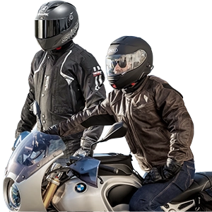 Two motorcyclists wearing black airbag jackets and helmets, one sitting on a BMW.